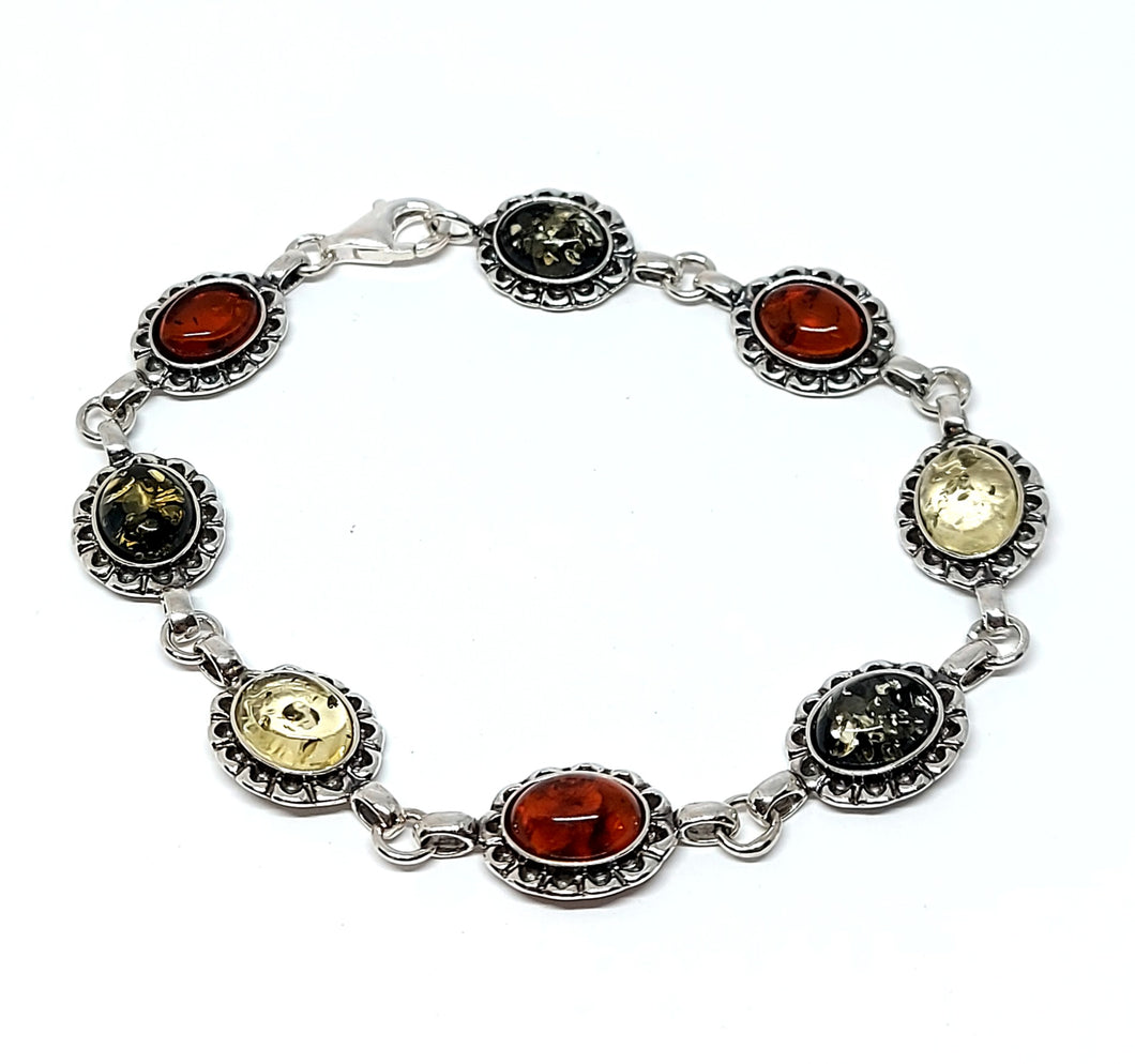 Bracelet with green amber and antique pattern (925)