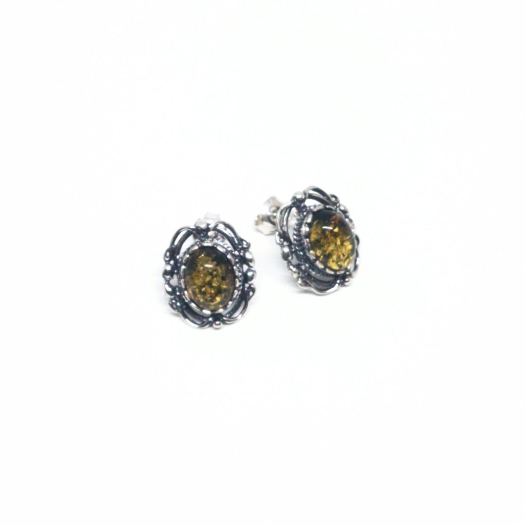 <transcy>Amber ear studs 10 mm with twisted edge (925)</transcy>