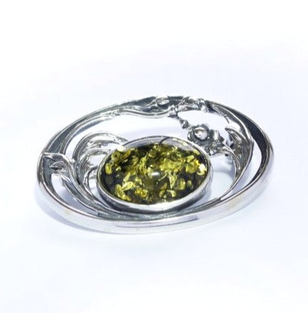 Brooch with green amber and antique pattern (925)