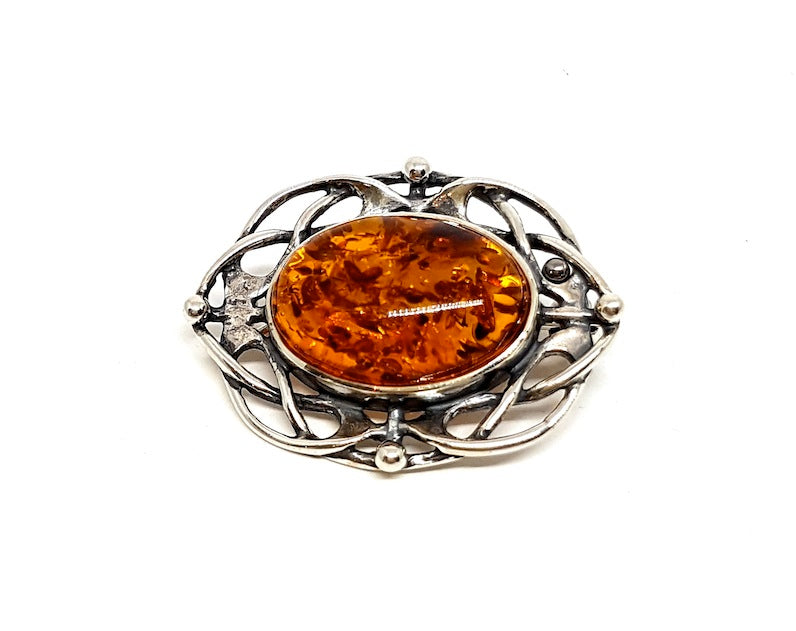 Brooch with amber and antique pattern (925)