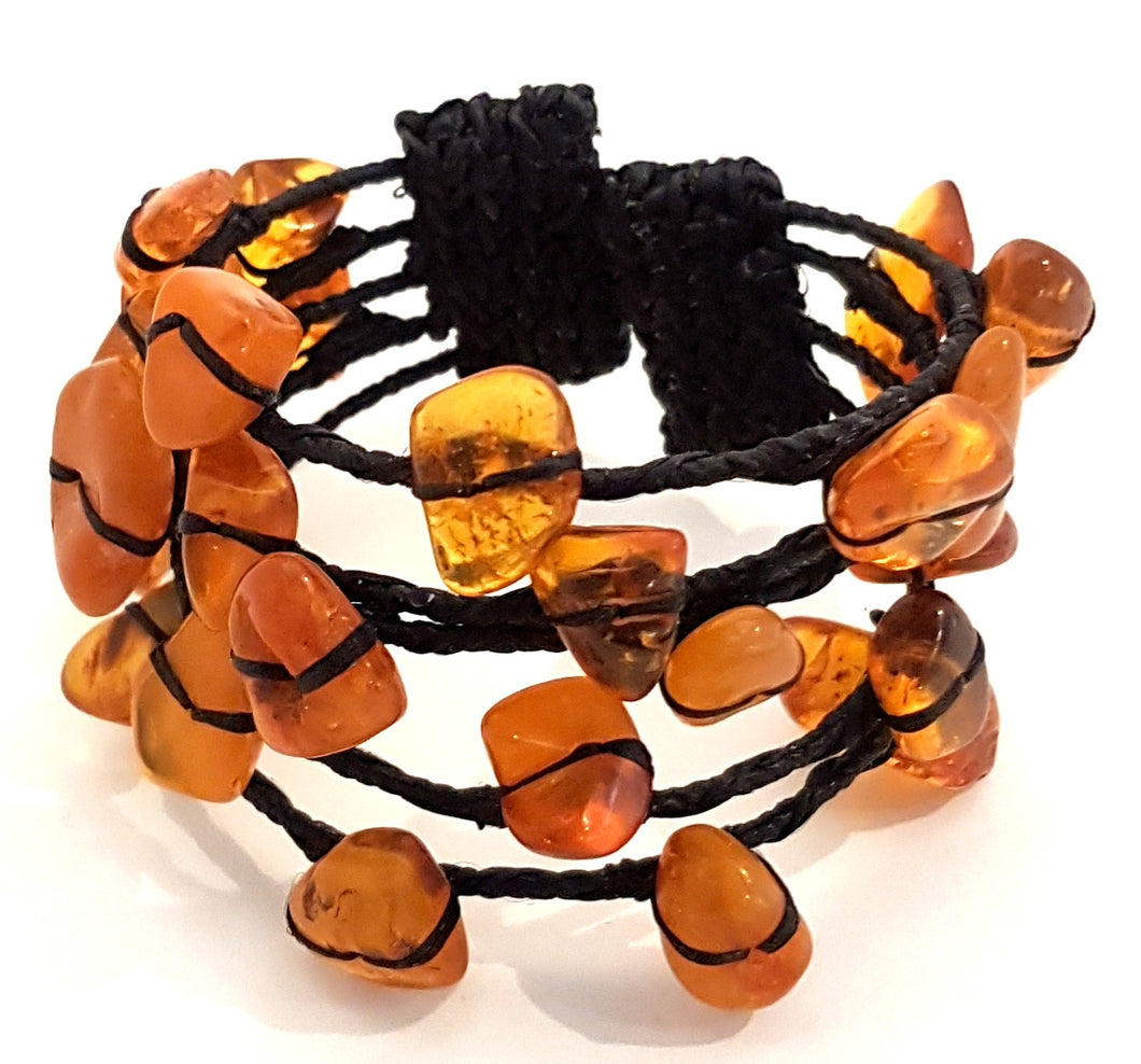 Bracelet with amber and black string wire