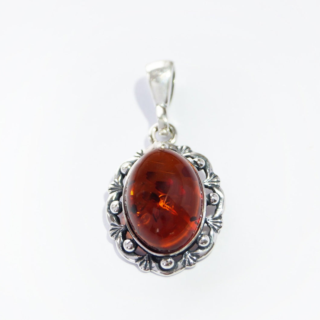 <transcy>Green amber pendant open pattern (925)</transcy>